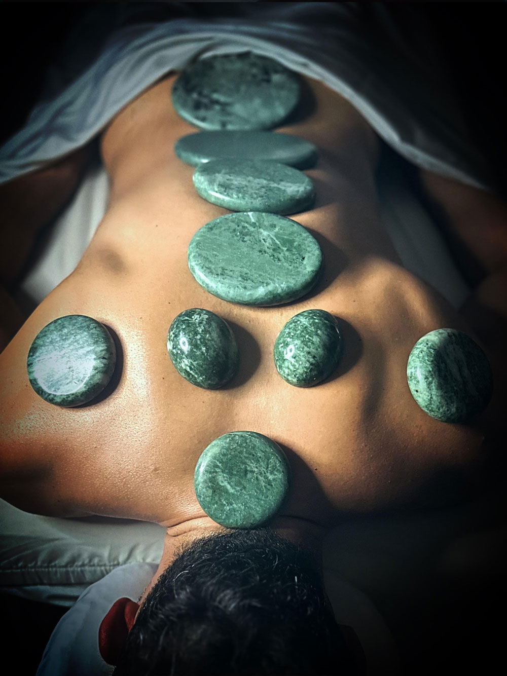 image of parker performing jade massage